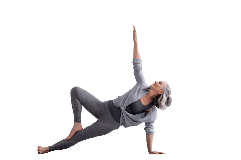 middle aged lady doing a yoga pose to shoe balance training benefits