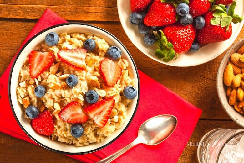 Healthy homemade oats with blueberries and strawberries in a bowl