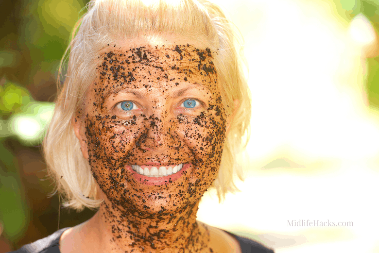 Woman with a coffee ground face mask