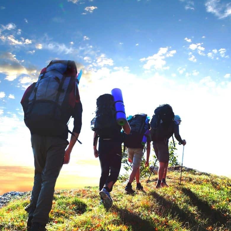 4 ruckers with backpacks, poles and the best boots for rucking